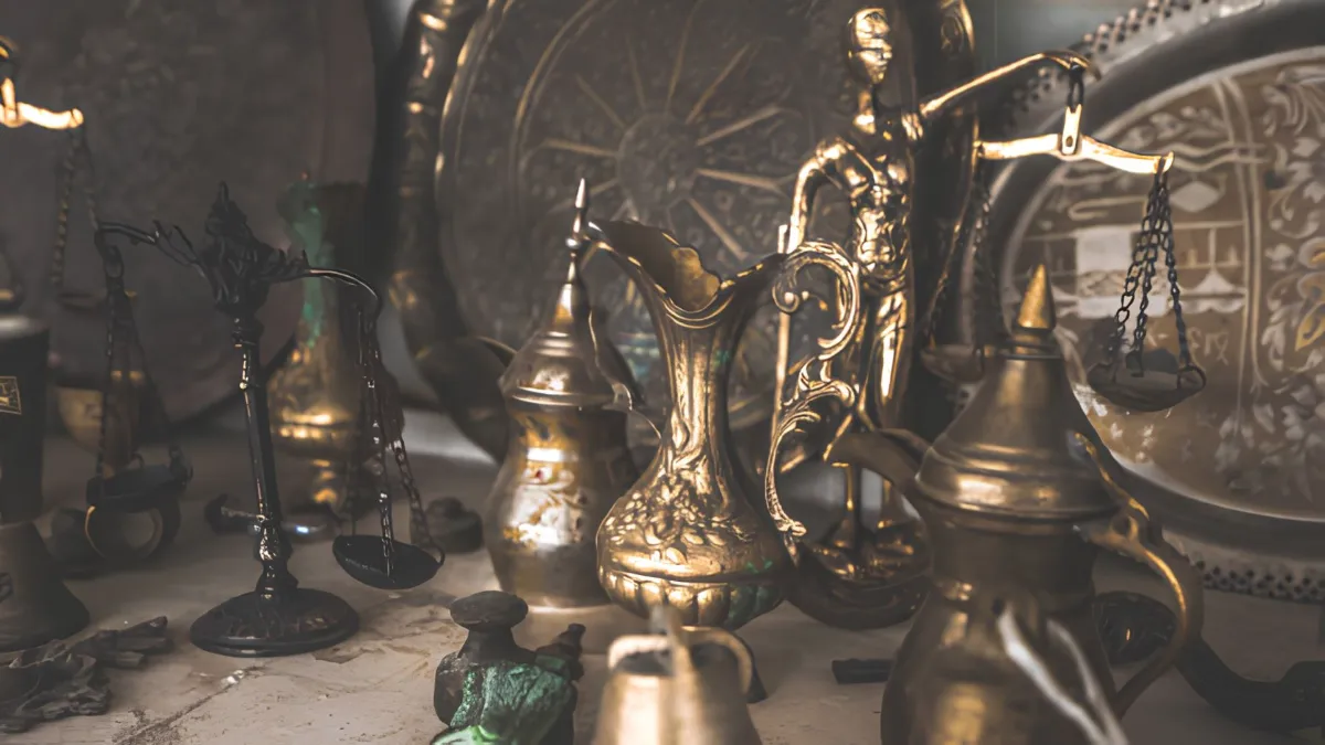 Antique brass collectibles arranged for identification and research